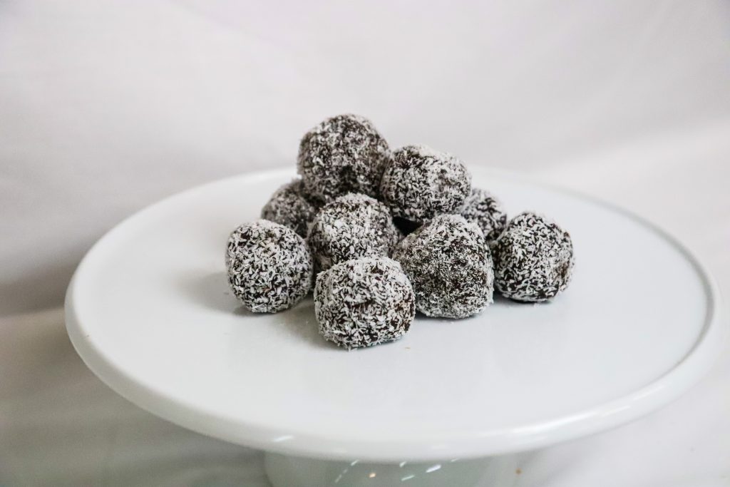 Rum Balls made fresh in house and coated in coconut