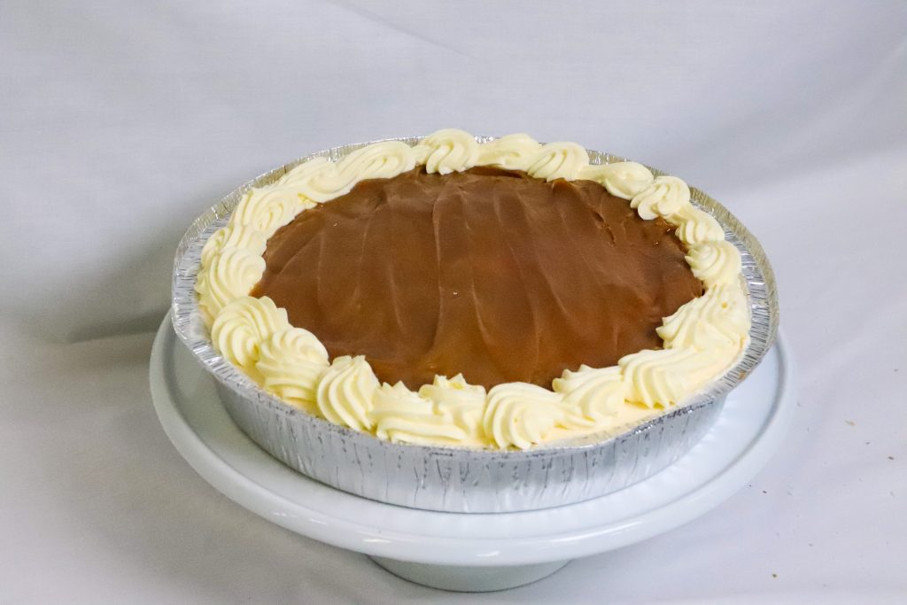 Fresh Chilled Cheesecake topped with fresh caramel and fresh cream