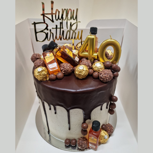 chocolate drip cake for 40th birthday with Bundaberg rum and chocolates