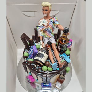 Ken doll drip birthday cake with alcohol
