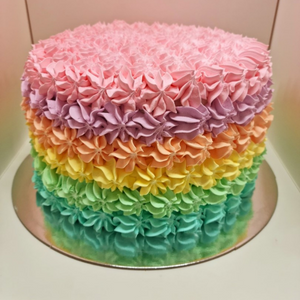 Rainbow piped kids birthday cake