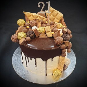 mudcake with chocolate drip and topped with assorted chocolates