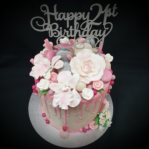 edible flowers and chocolates pink drip cake