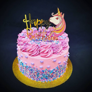 unicorn pink and pruple birthday cake