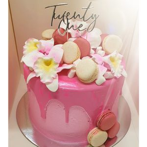 pink drip tropical birthday cake