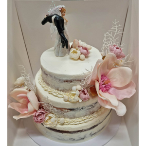 3 tier wedding cake with large pink flowers