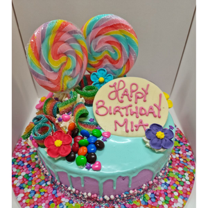 lollipop and m&m drip cake