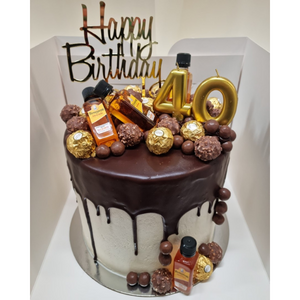 drip birthday cake 40th with chocolate and alcohol
