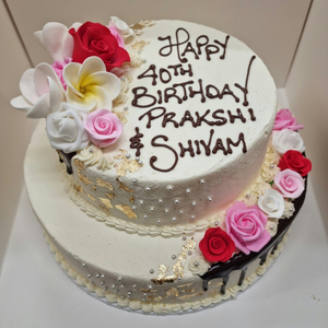 2 tier birthday cake with sugar flowers