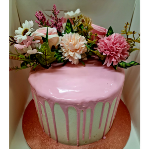 pink drip cake with florals