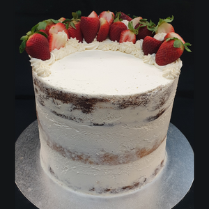 naked cake topped with strawberries