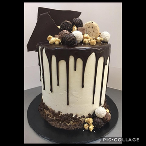 stacked mudcake with chocolate drip and topped with chocolates