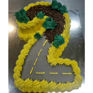 boys number cake with road dirt and trees